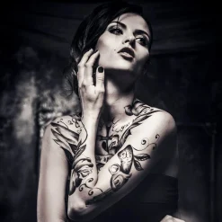 queence Acrylglasbild Tattoo